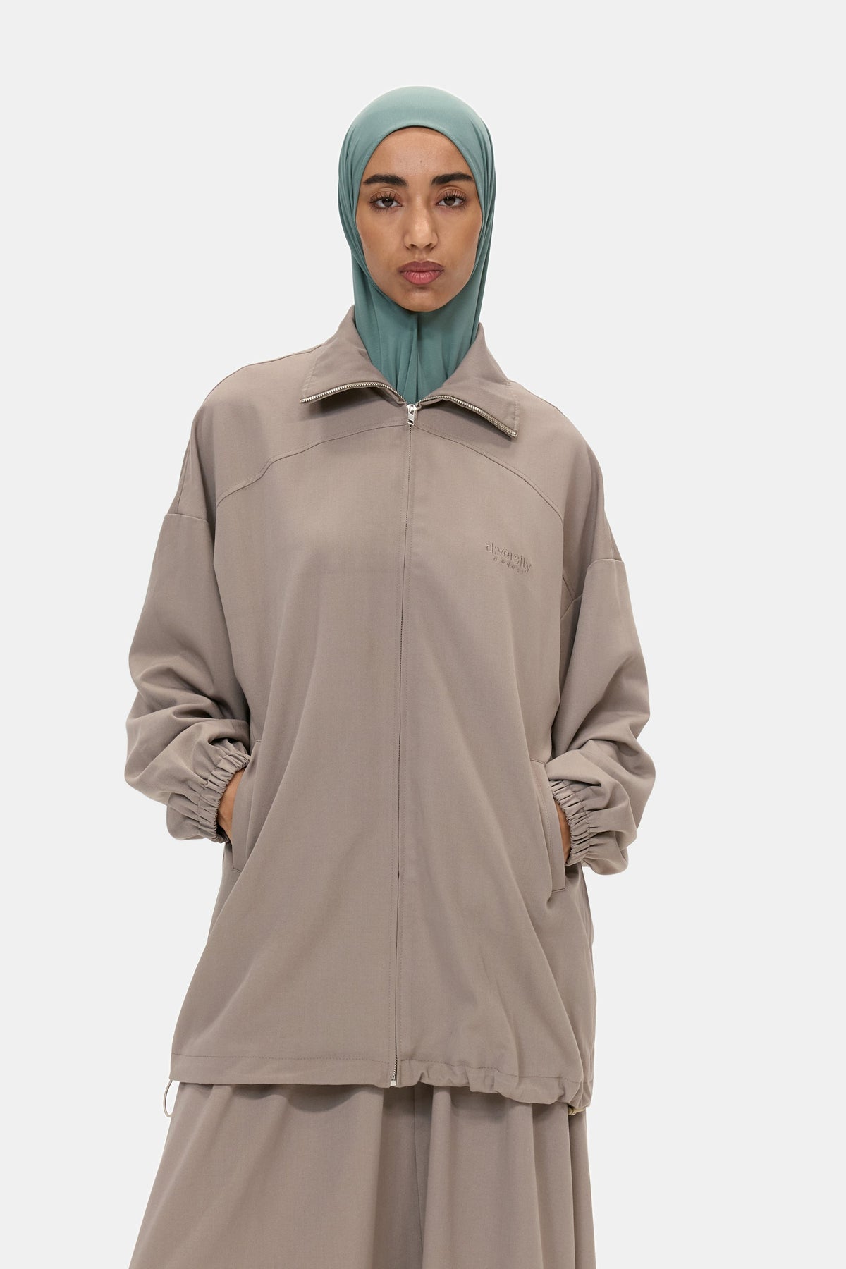 The Sculpted Jacket in Warm Taupe, collar and zip detail