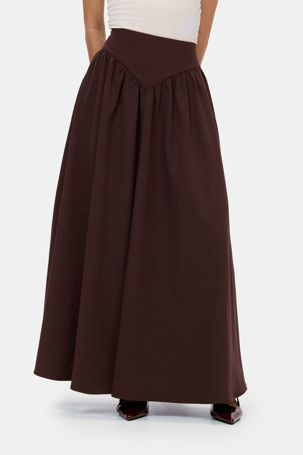 The Sculpted Maxi Skirt in Chocolate Brown, front