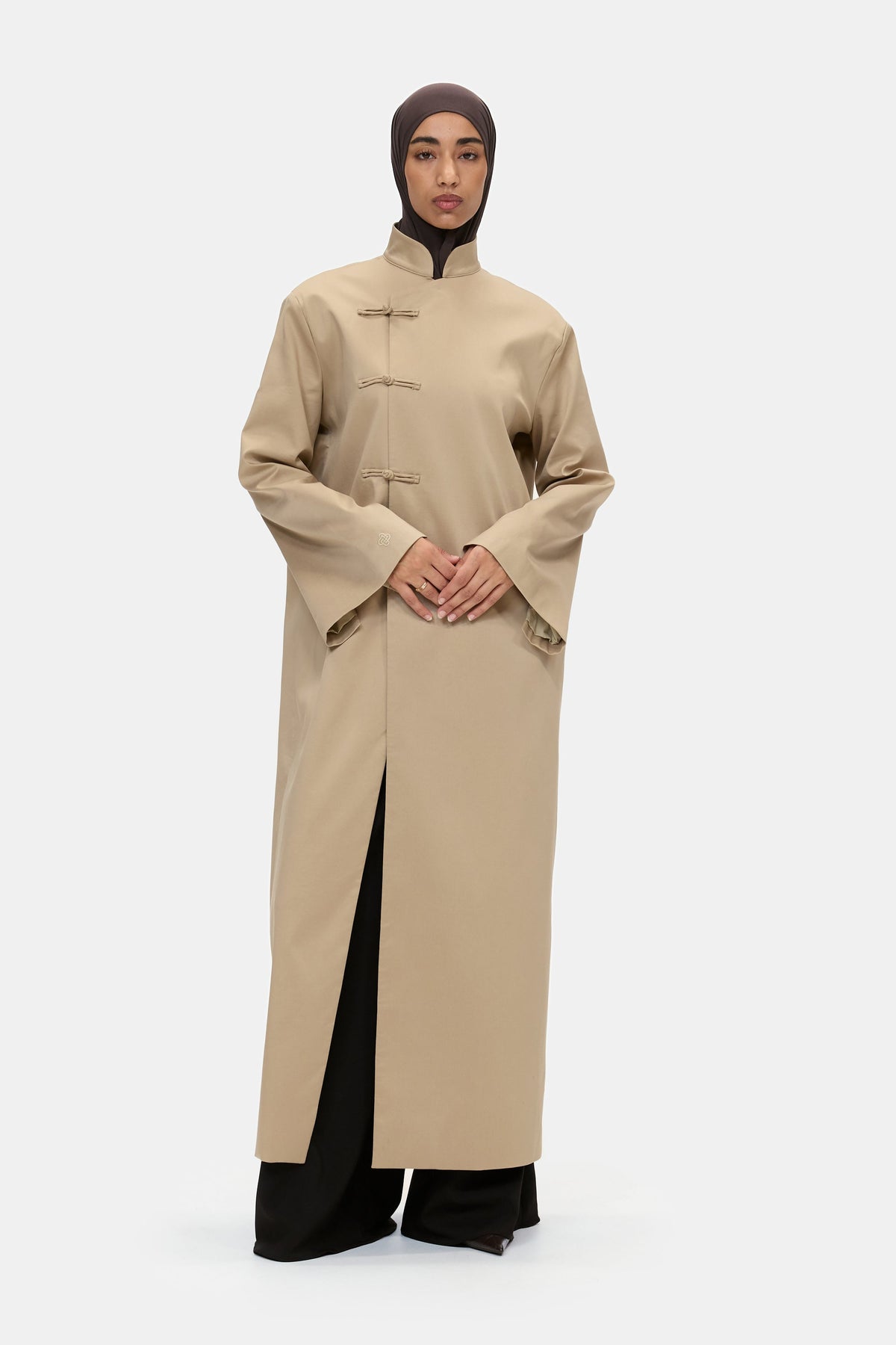 The Asymmetric Long Coat in Camel, worn