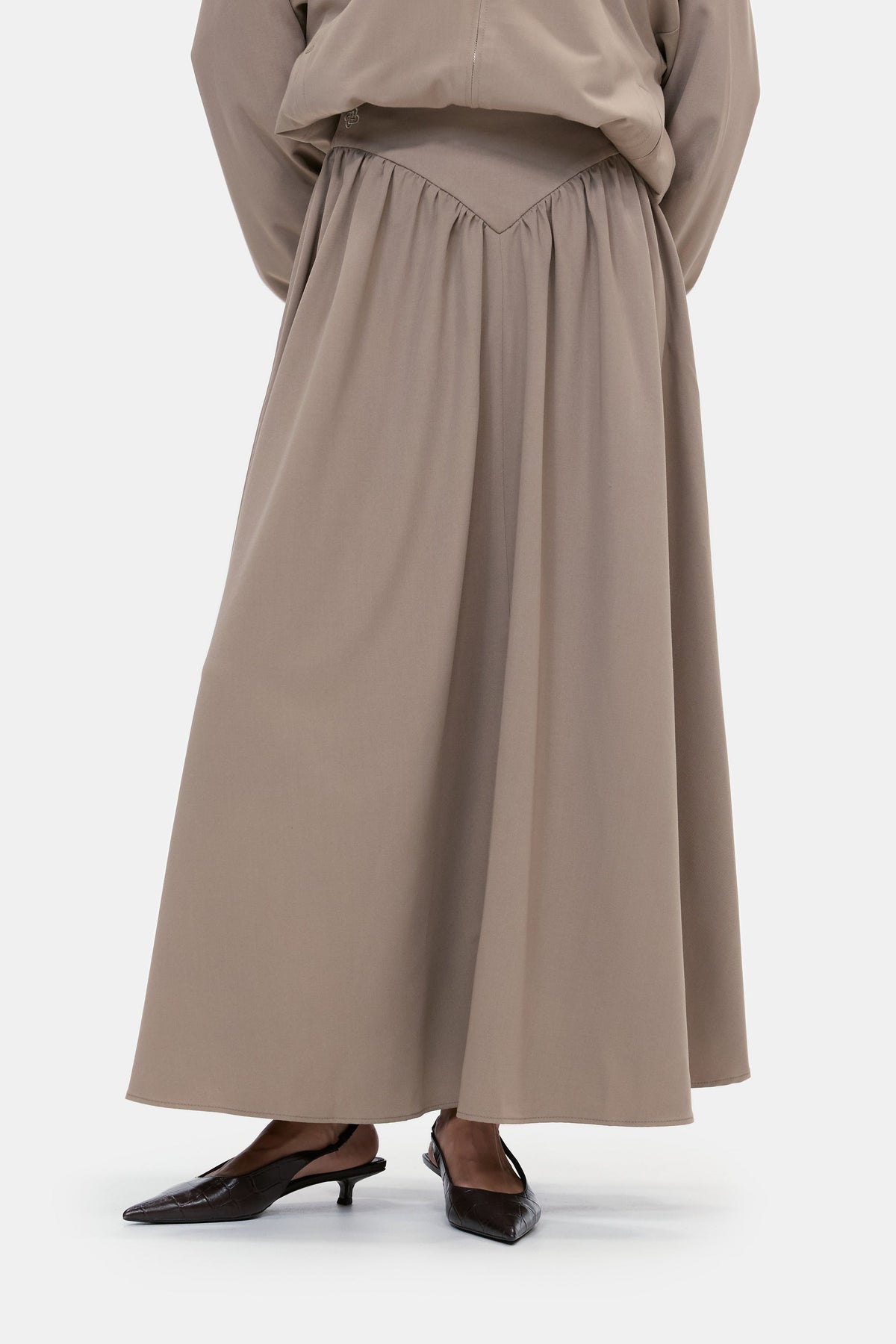 The Sculpted Maxi Skirt in Warm Taupe, front