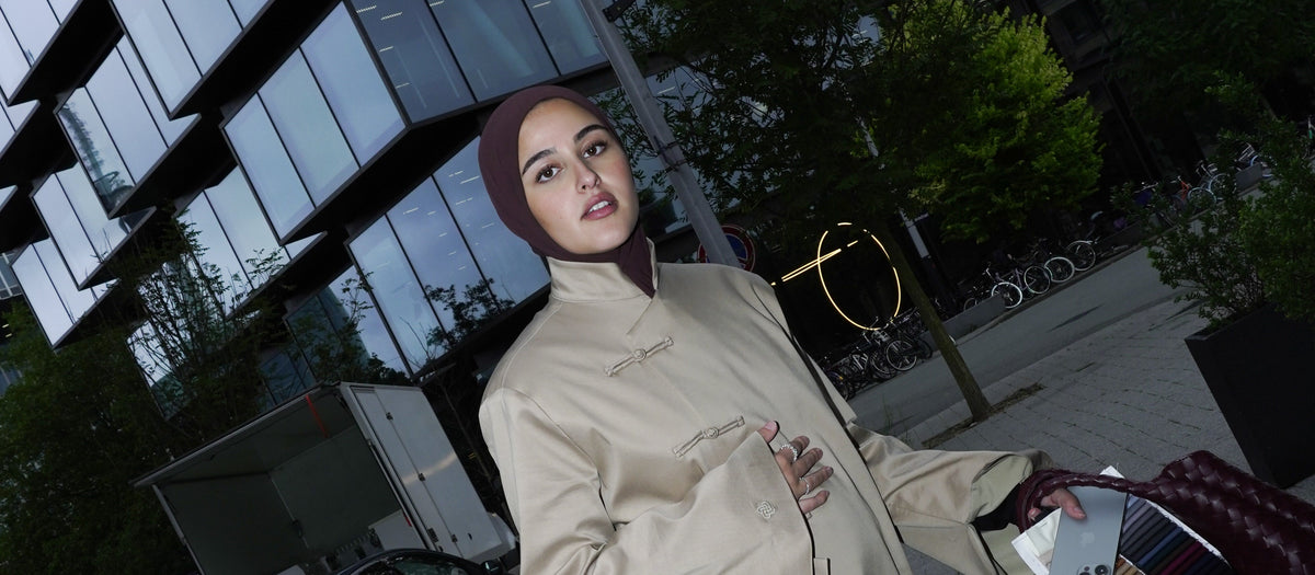 Model in the Asymmetric Long Coat in camel, on the street